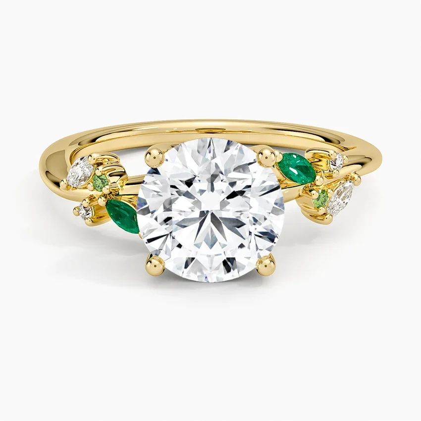 A 3.0 ct Round Brilliant in a Vine of Emeralds